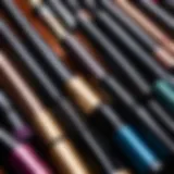 Close-up of various affordable mascara tubes showcasing their unique designs