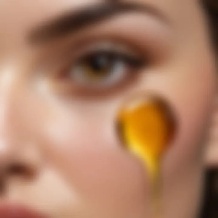 Close-up of oil being applied to skin