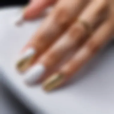 Stunning White and Gold Acrylic Nail Art Elegant white and gold acrylic nail design