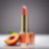 A close-up of peach-toned lipstick on a vanity