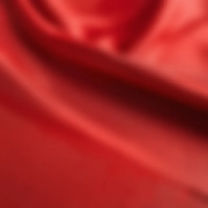 A swatch of red fabric stained with dye to demonstrate color adherence and vibrancy.