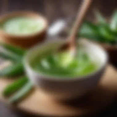 Aloe Vera Gel Application Aloe vera gel in a small bowl with a wooden spoon