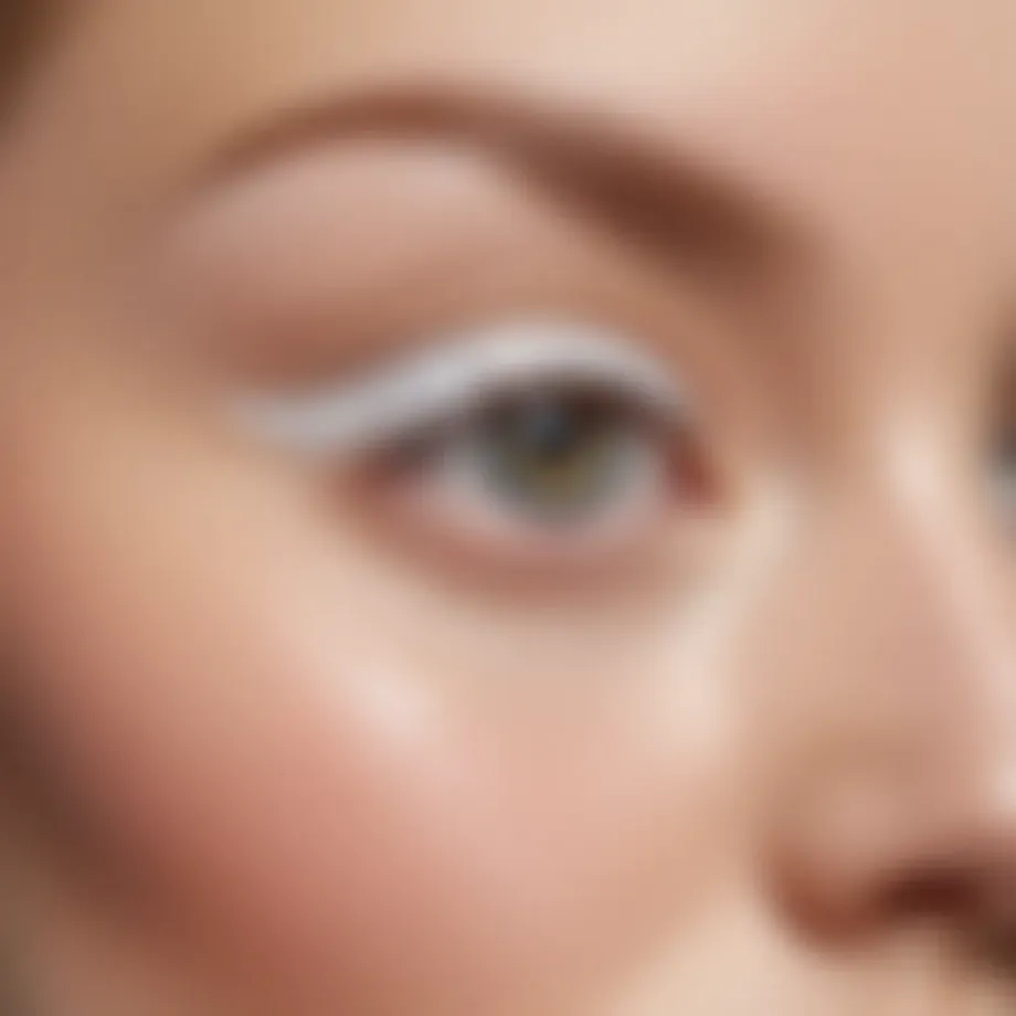 Close-up of white eyeliner applied on the waterline, enhancing the eyes.