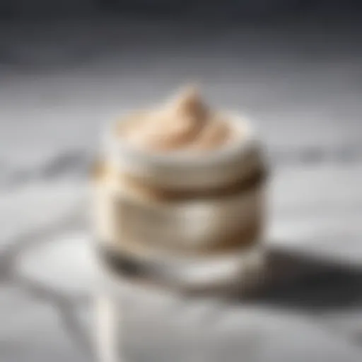 Close-up of a luxurious eye cream jar on a marble countertop